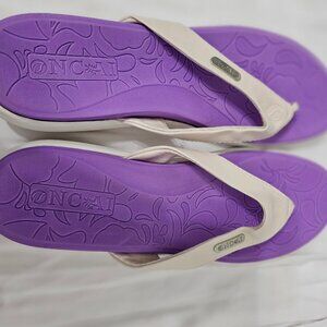 Oncai purple and grey flip flops
